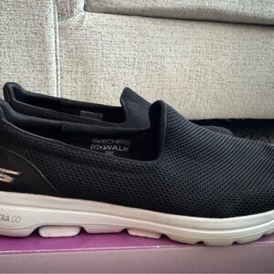 Skechers Black and White Slip-On Shoes
